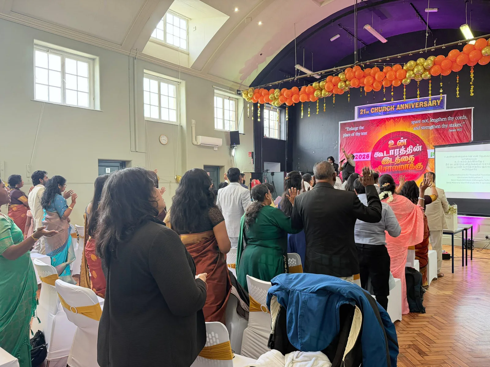 Church of Grace congregation worshipping during the 21st Church Anniversary celebration
